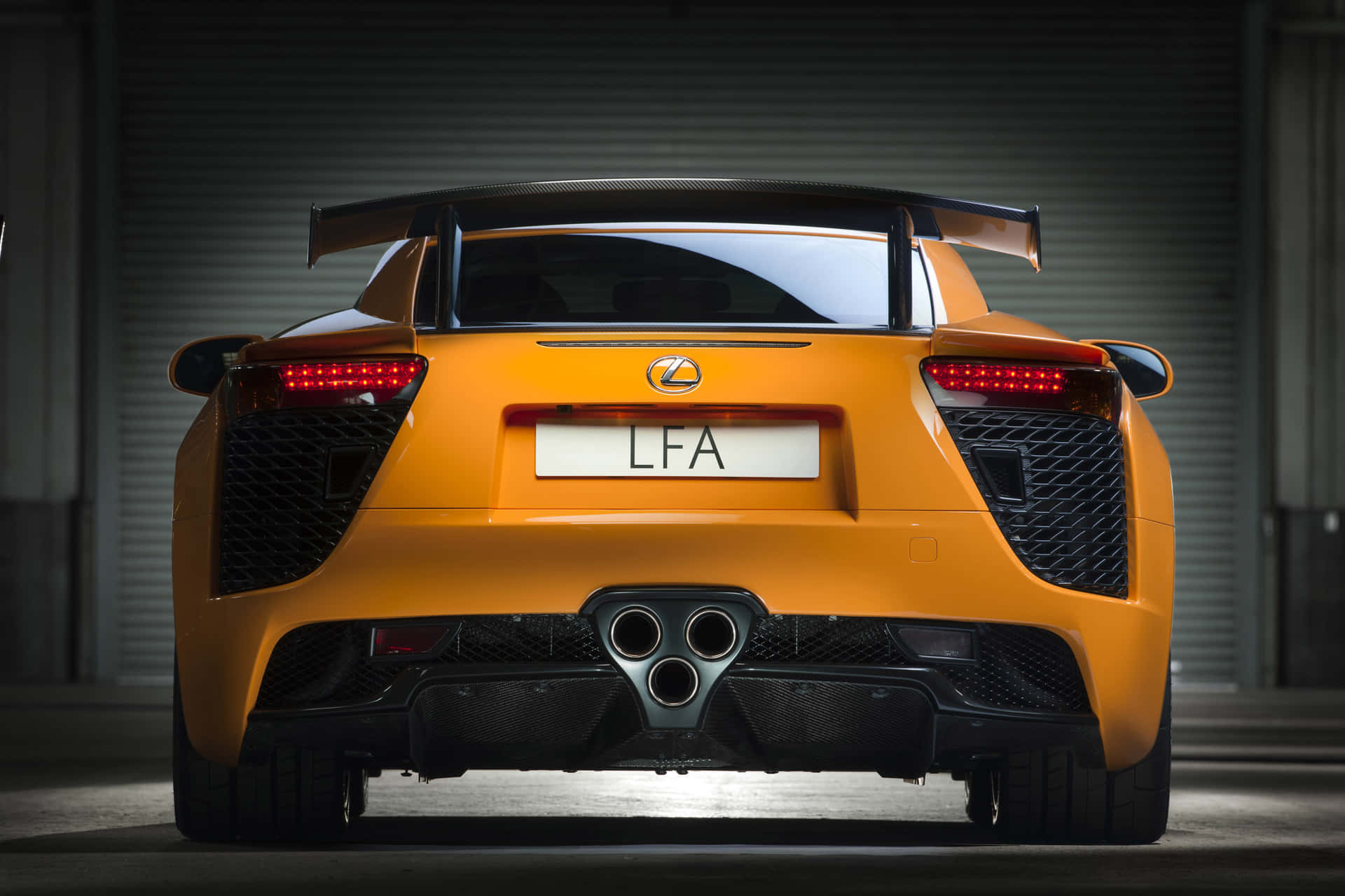 Sleek Lexus LFA sports car on the road Wallpaper