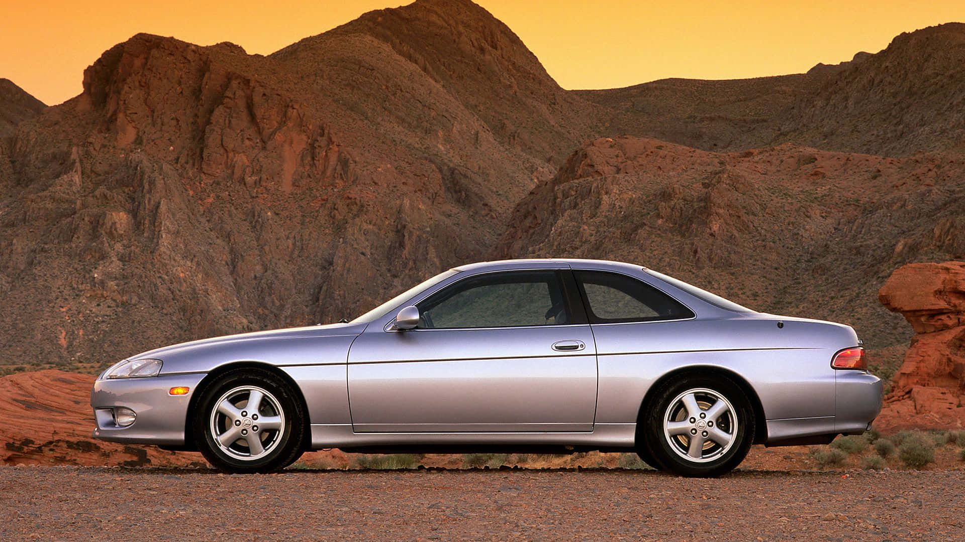 Stunning Lexus SC 300 in a Vibrant Cityscape Wallpaper