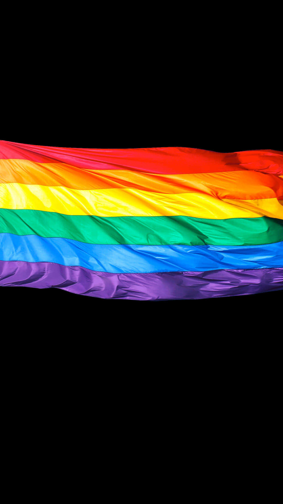 Image  Rainbow LGBT Flag Flying in the Wind on a Bright Sunny Day Wallpaper