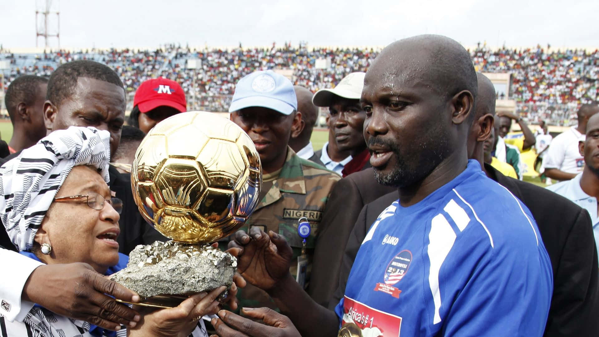 Liberian George Weah With Ballon D'or Trophy Background