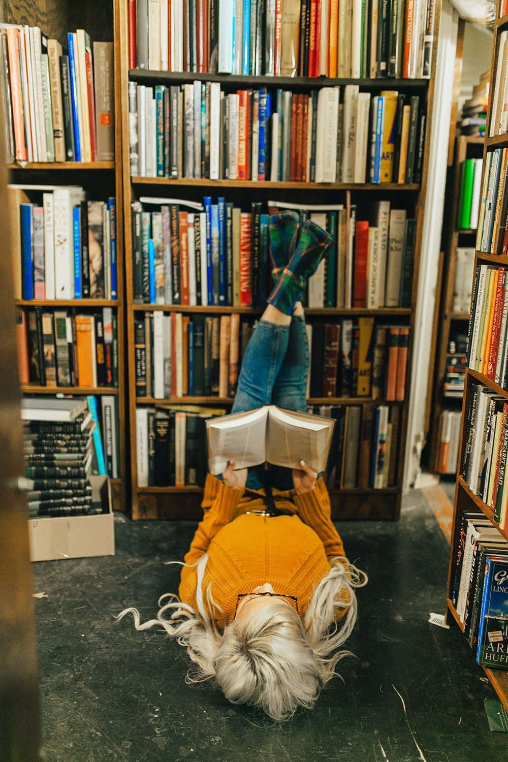 Upside-down Girl Reading In A Library Picture