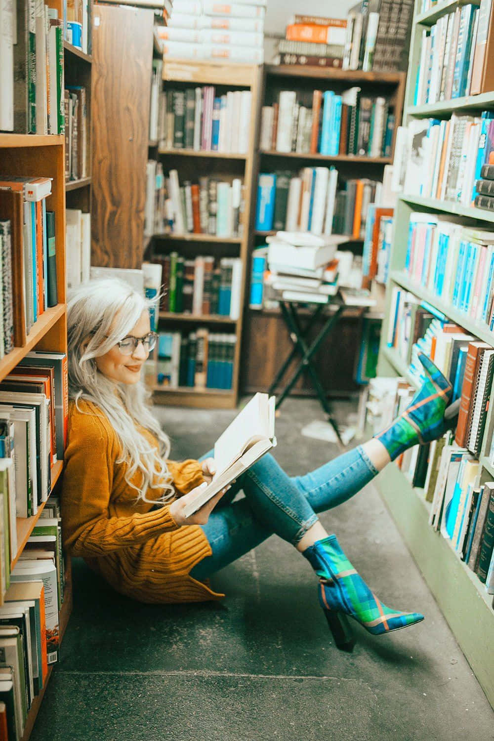Woman Leaning Inside A Library Picture