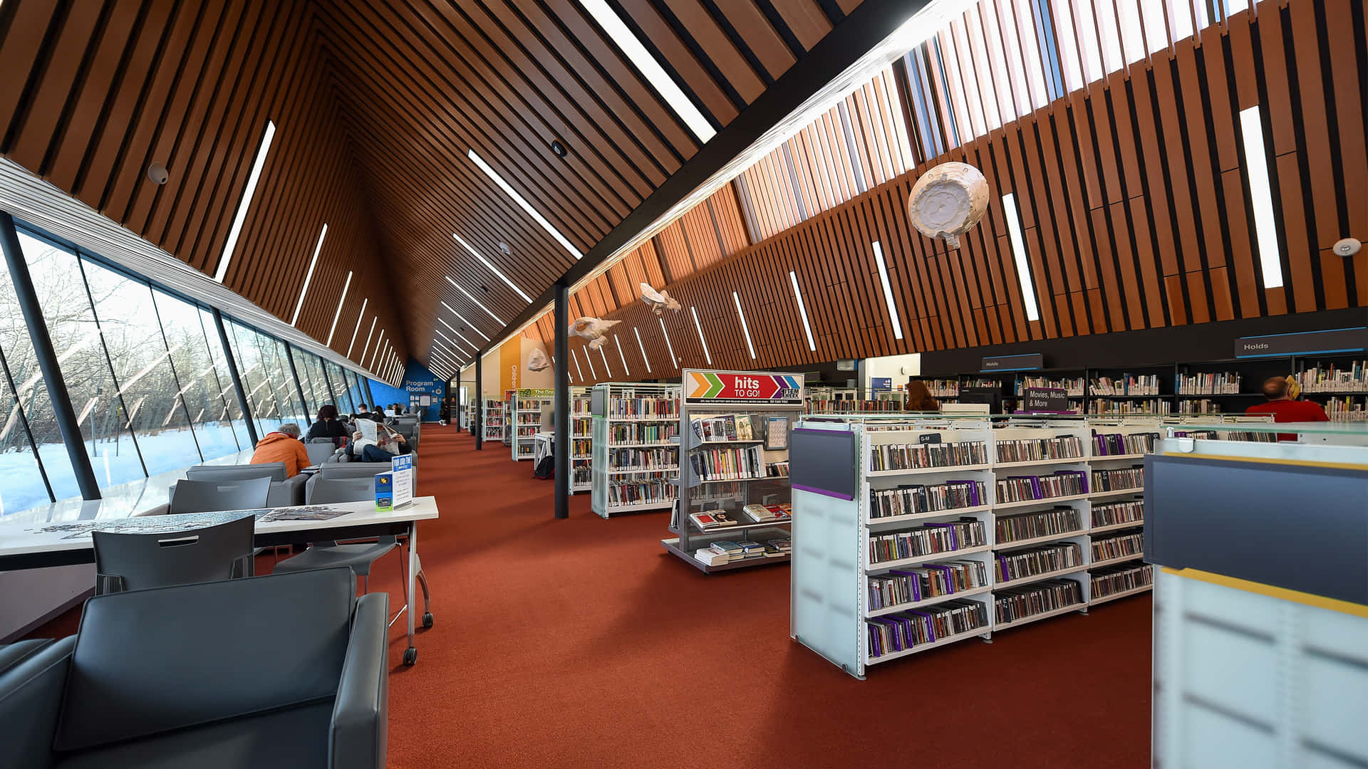 A Library With A Large Number Of Books On Shelves