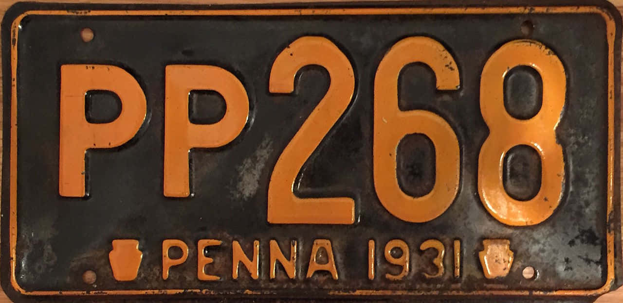 A Vintage License Plate With The Word Pp268