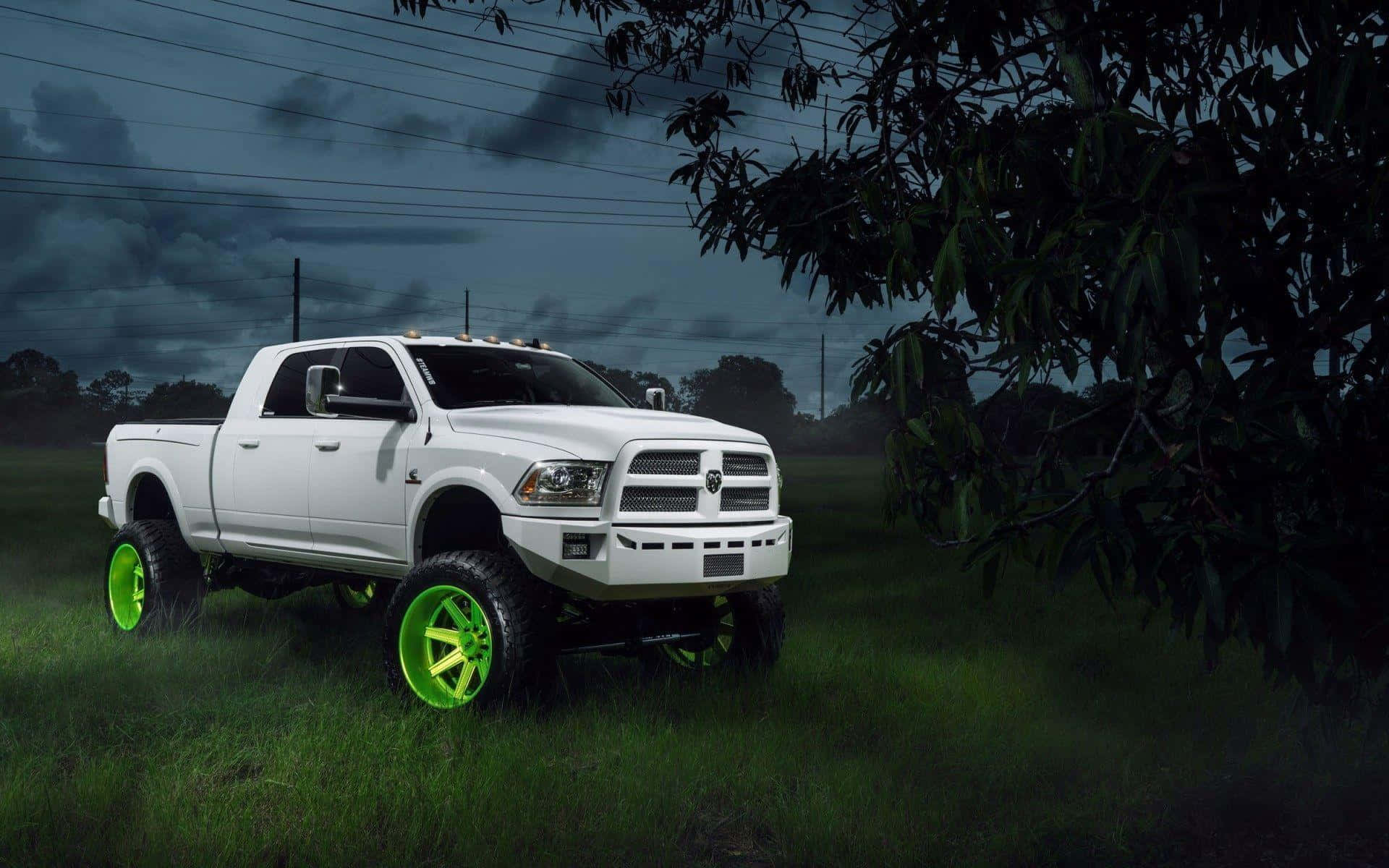 White Lifted Truck With Green Wheels Wallpaper