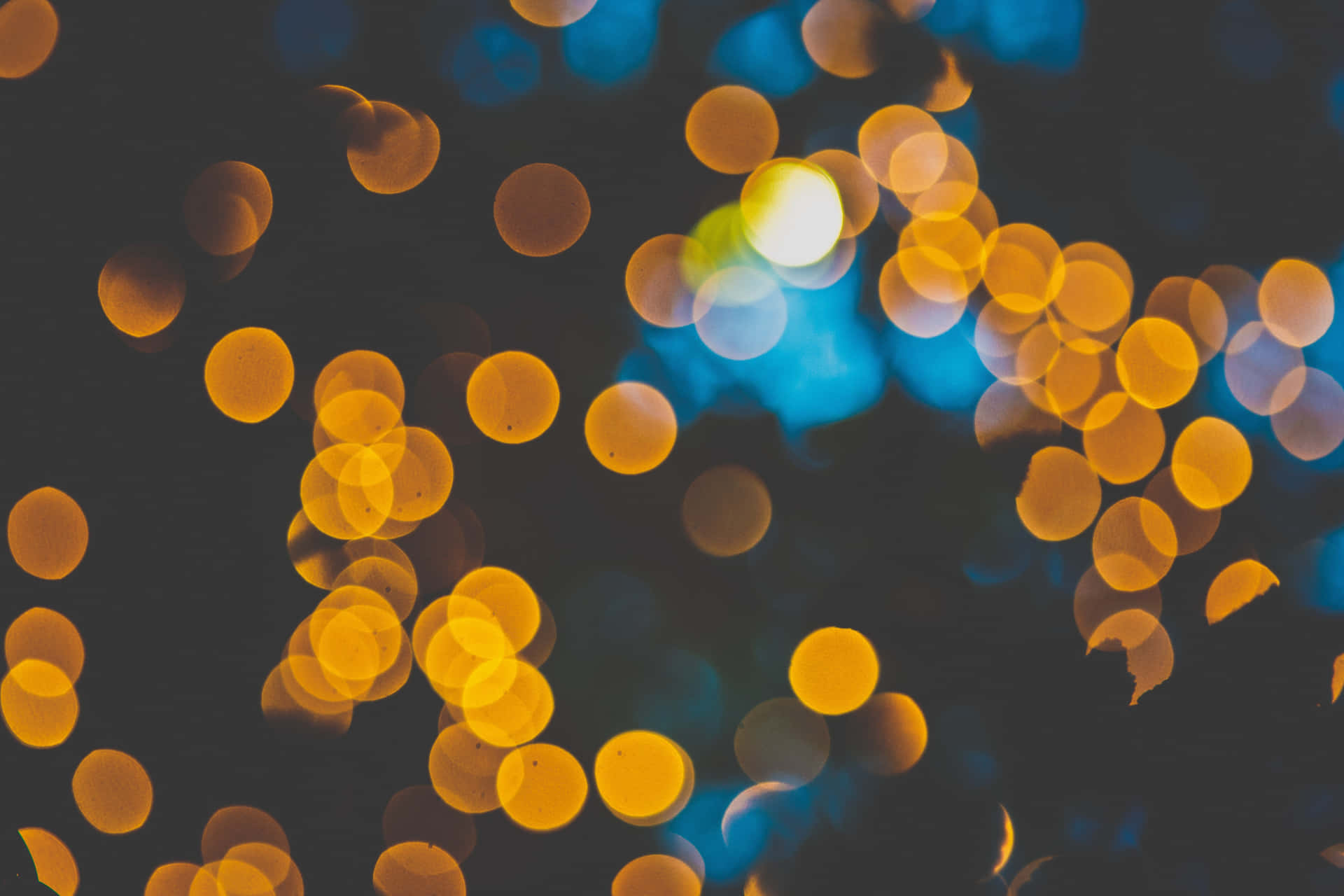 Yellow And Blue Bokeh Lights Background
