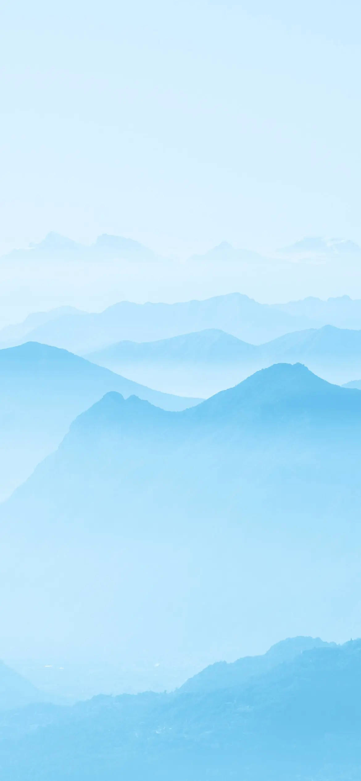 Light Blue Phone Foggy Mountains Wallpaper