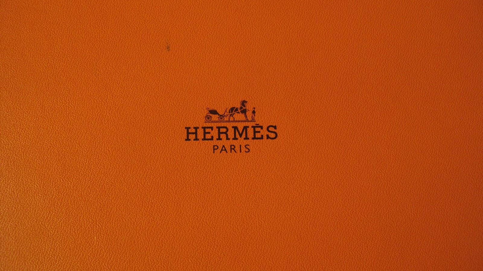 Hermes Strutturato Marrone Chiaro Sfondo