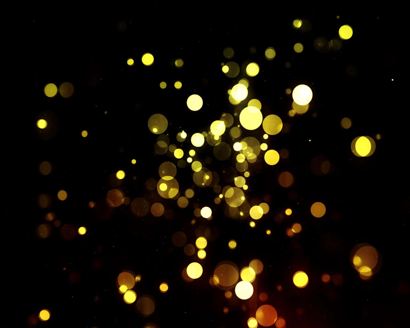 Guldigbokeh-ljuseffekt Bild