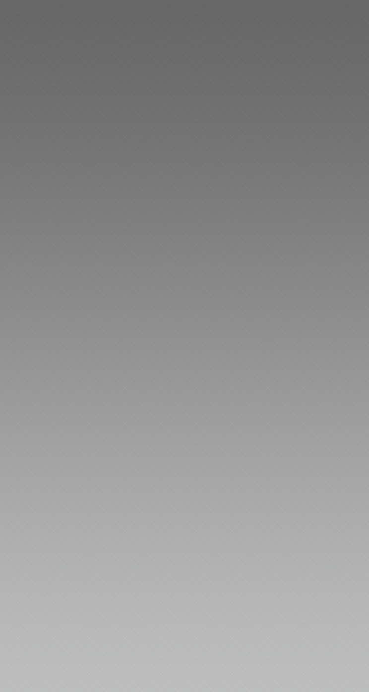 Grågradient-lyshintergrund til iPhone Wallpaper