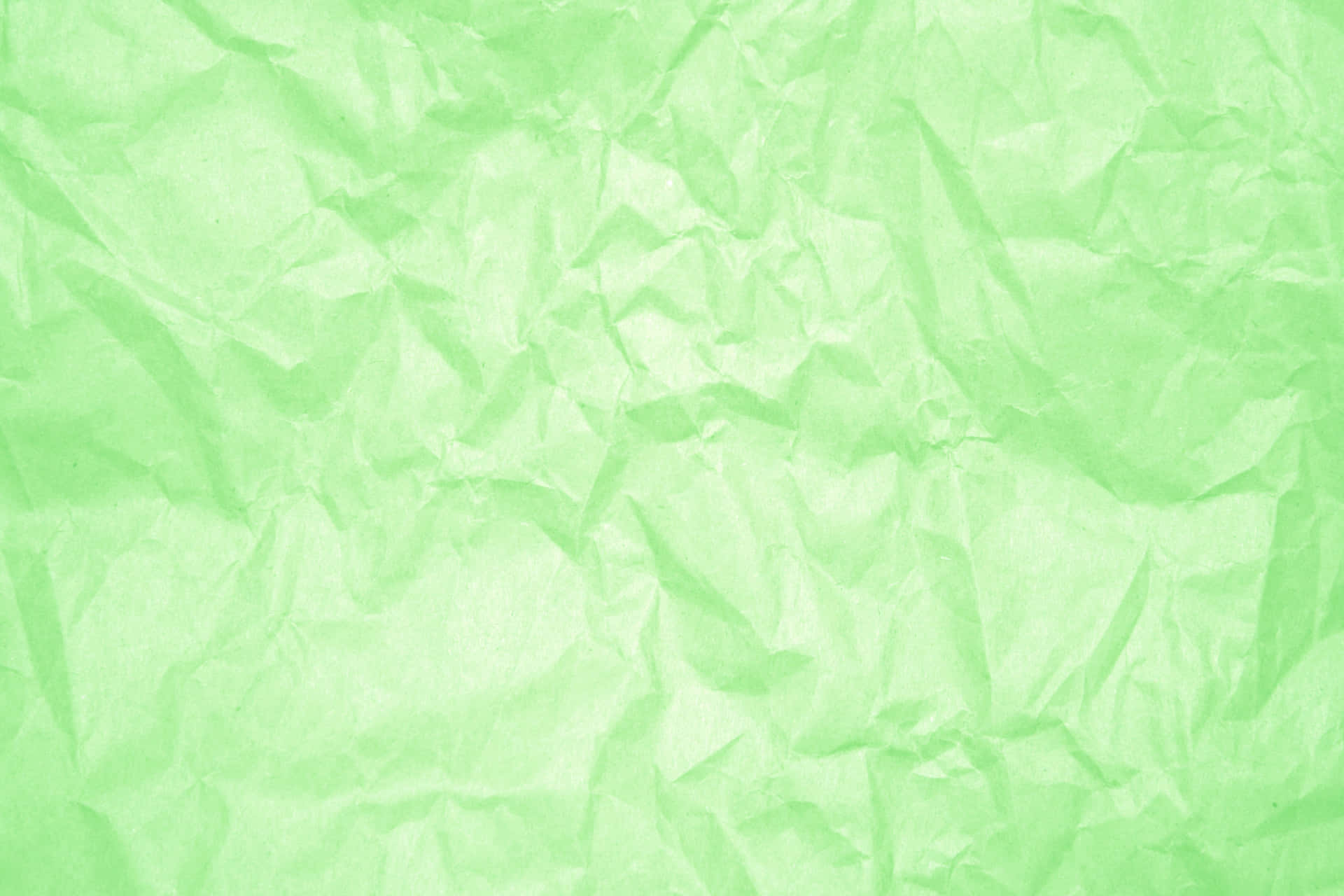 Light Green Crumpled Paper Background