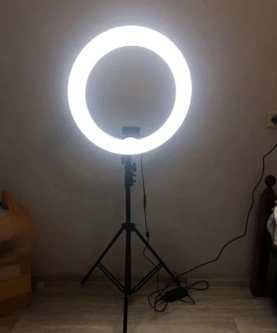 A Ring Light On A Tripod In A Room