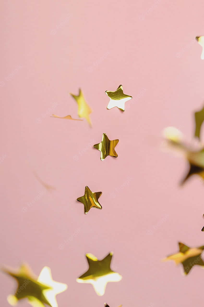 Eineweiche Und Glamouröse Kombination Aus Hellem Rosa Und Gold Wallpaper