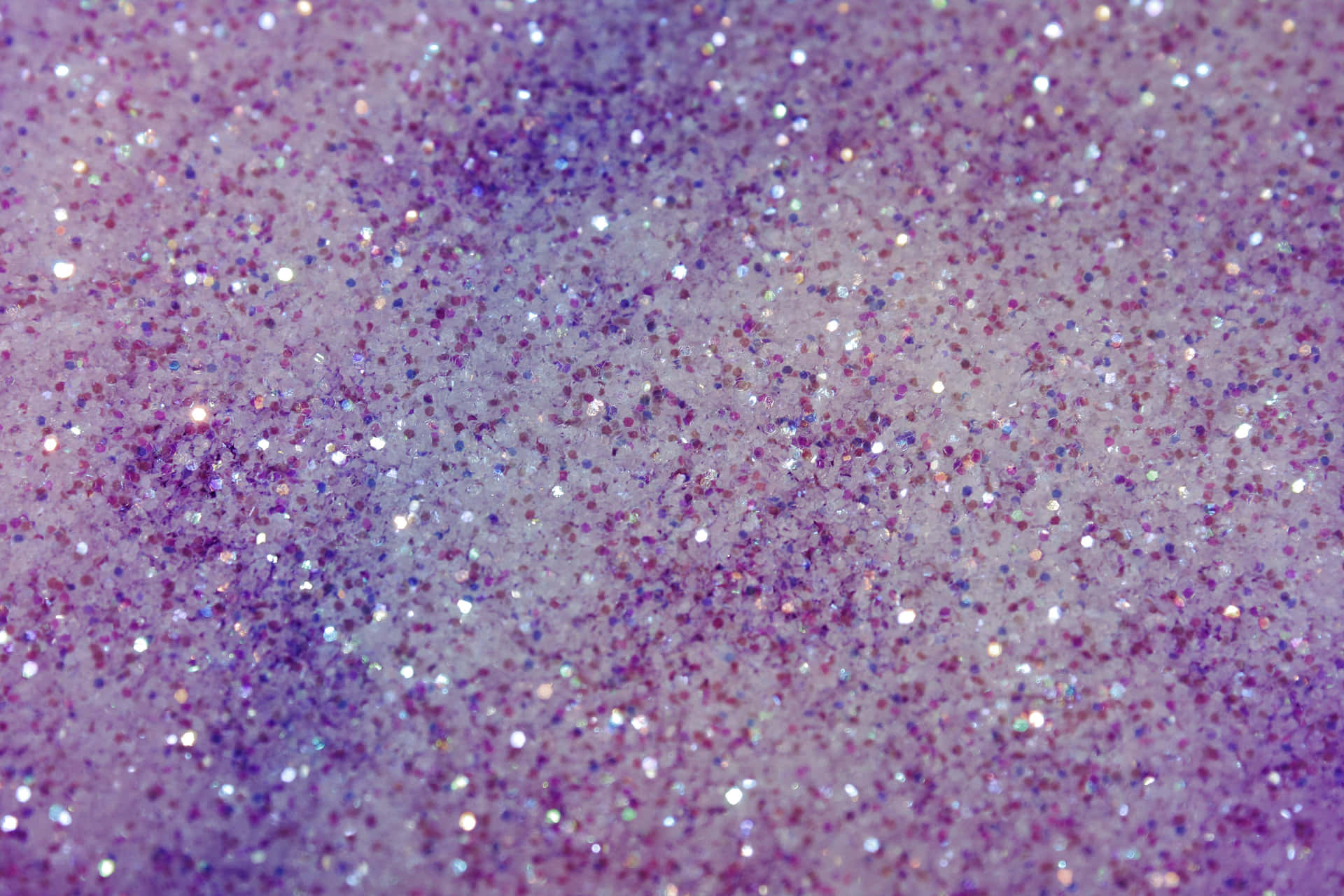 A Close Up Of A Purple Glitter Background