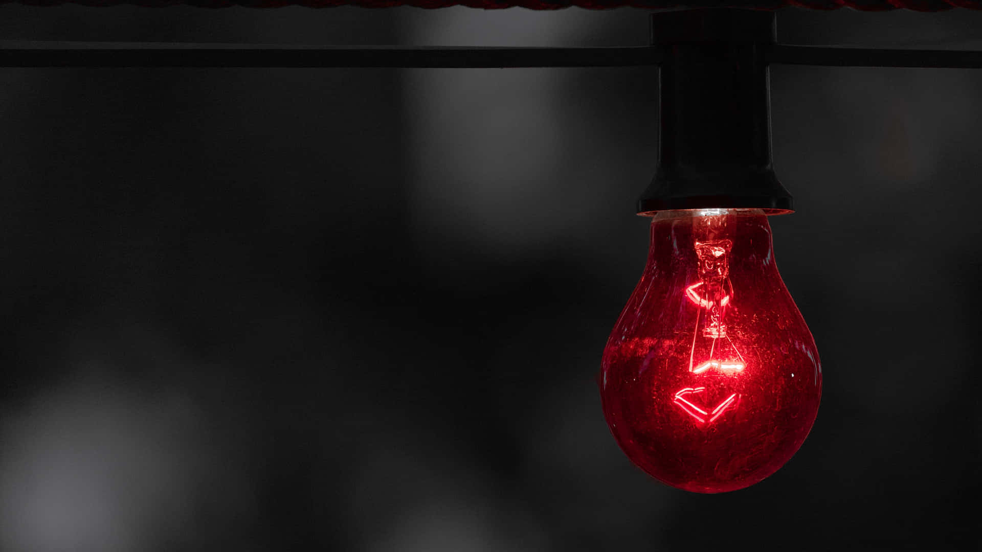 A Red Light Bulb Wallpaper