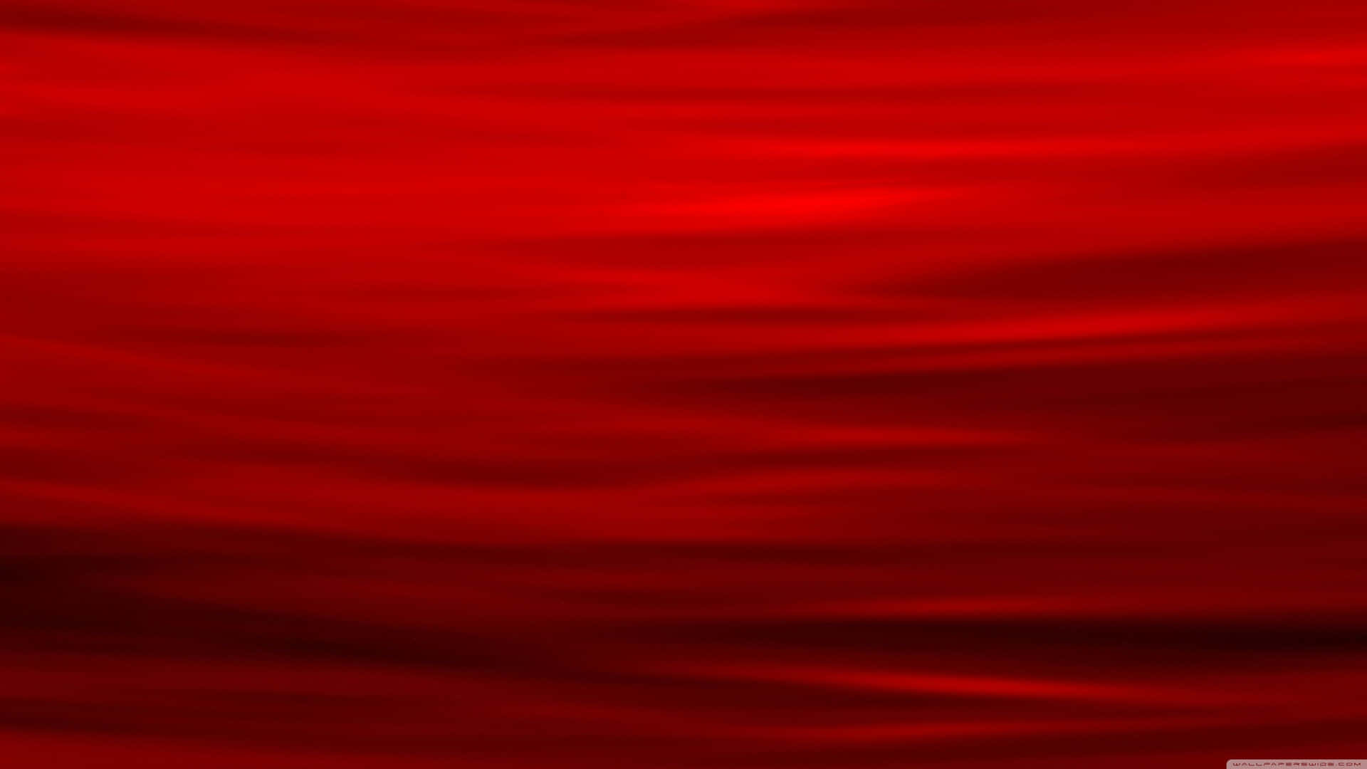 Et rødt abstrakt baggrund med waves der kaster lys rundt om Wallpaper