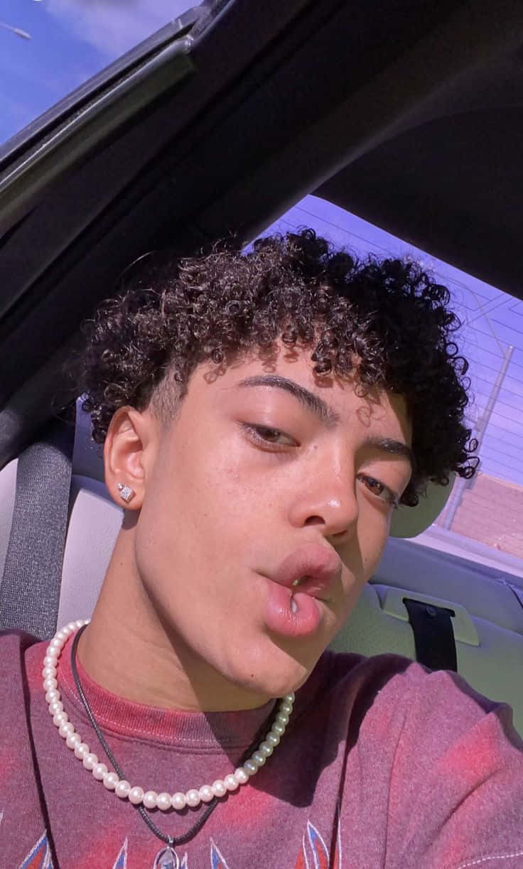 Light Skinned Boy With Curly Hair Selfie Wallpaper