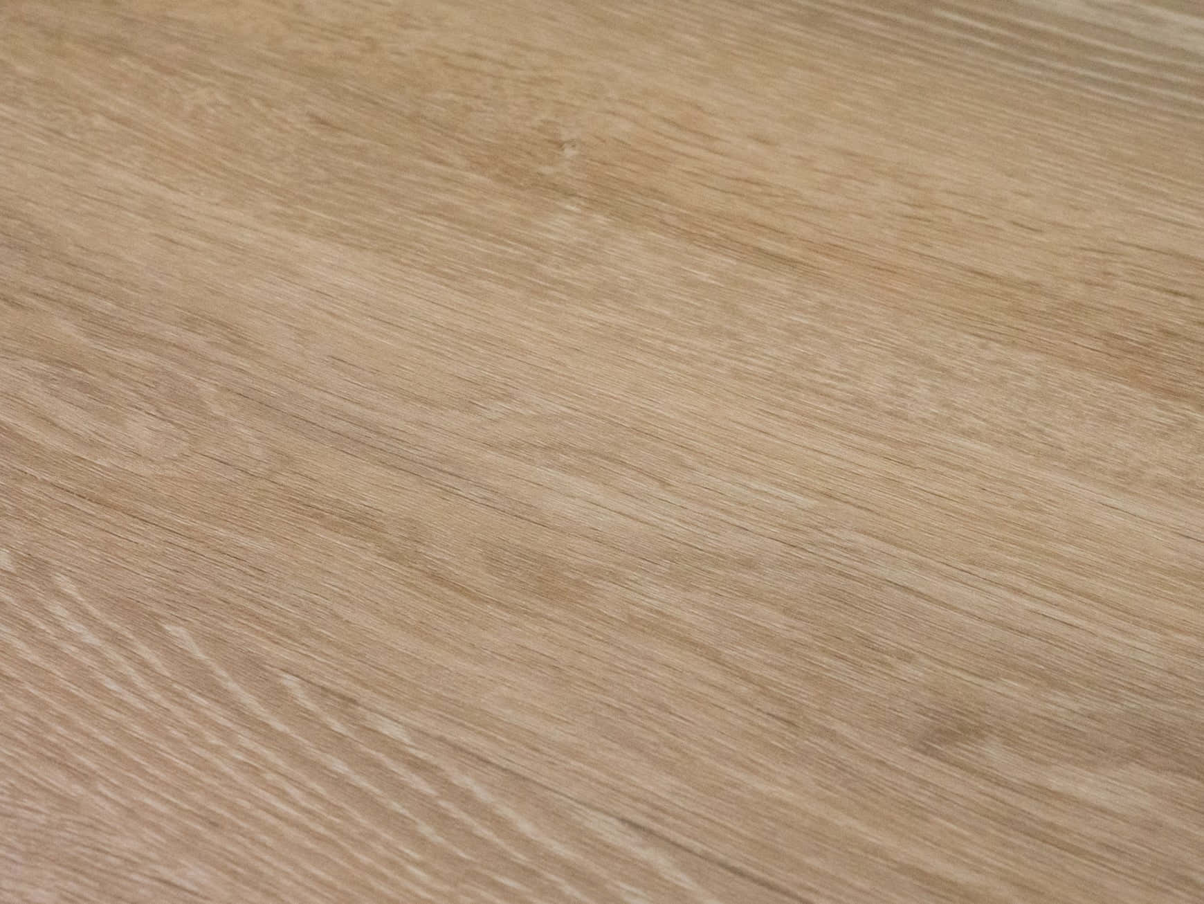 A Close Up View Of A Wooden Floor