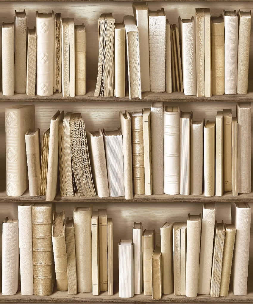 A Shelf Of Books On A Wooden Shelf