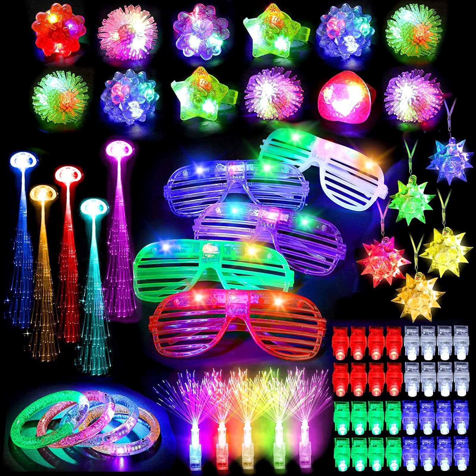 A Variety Of Party Supplies Including Glasses, Confetti, And Confetti