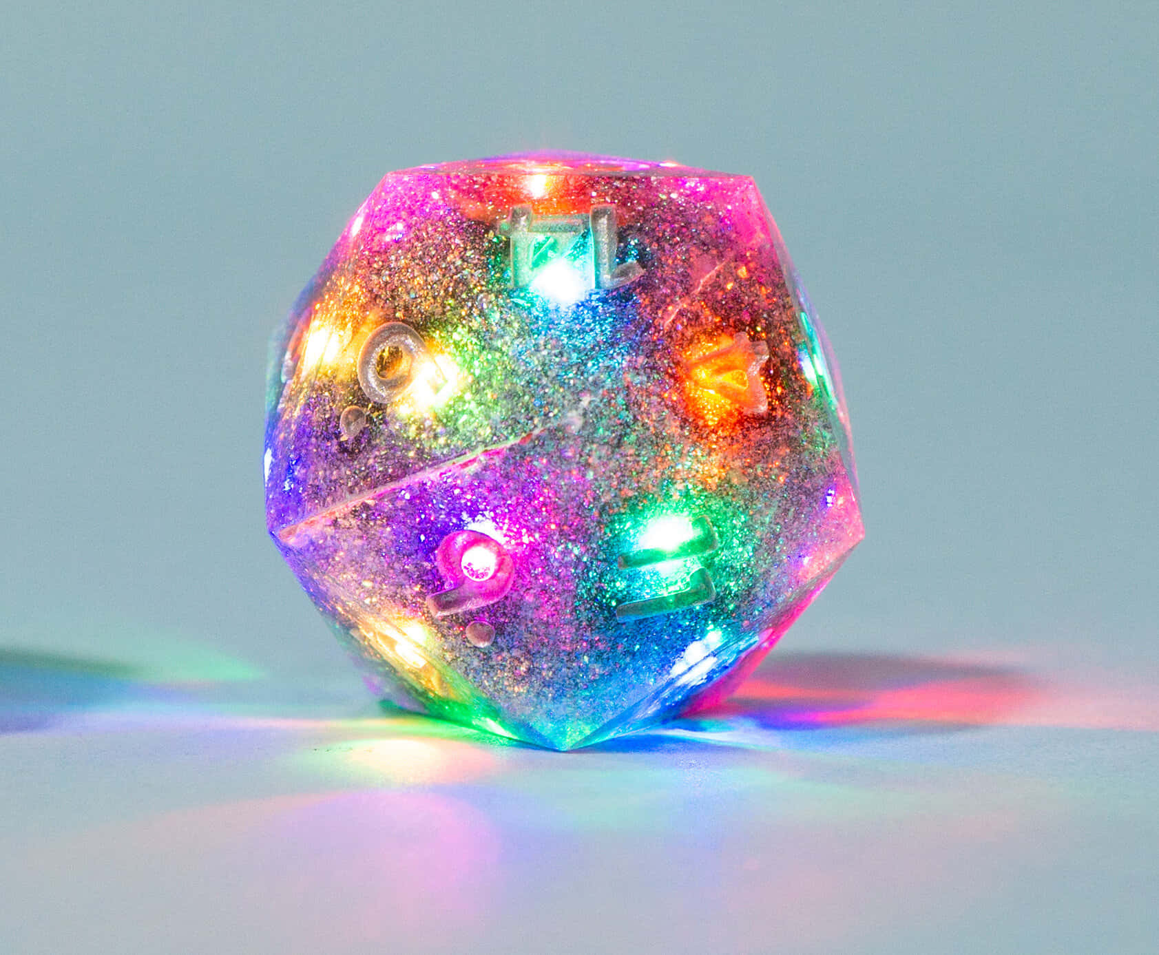 A Colorful D20 Dice With Lights On It
