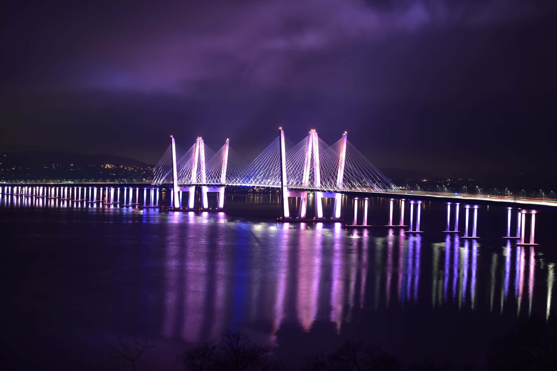 A Bridge Is Lit Up At Night