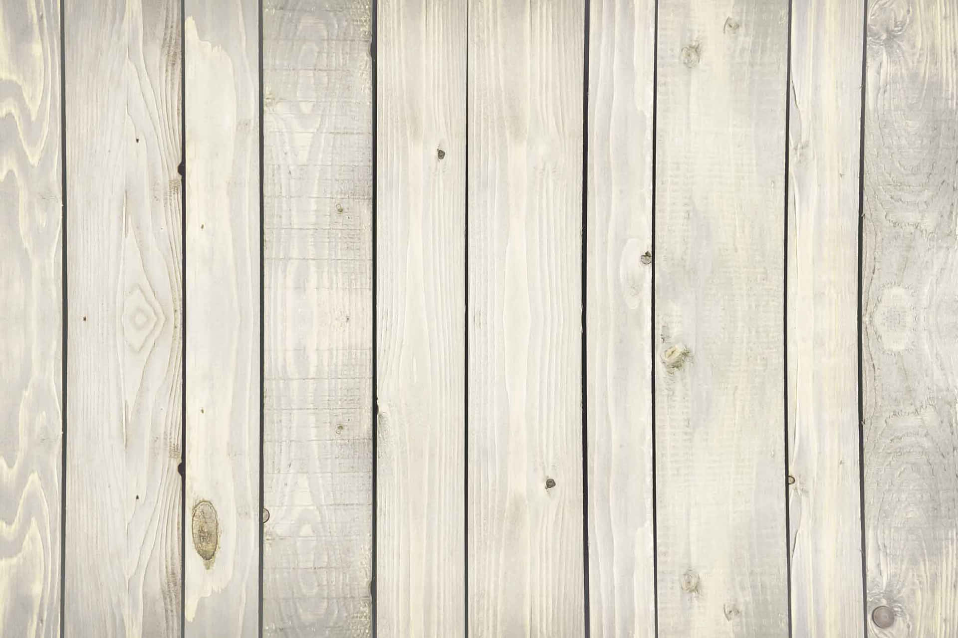 White Wood Planks With White Paint On Them