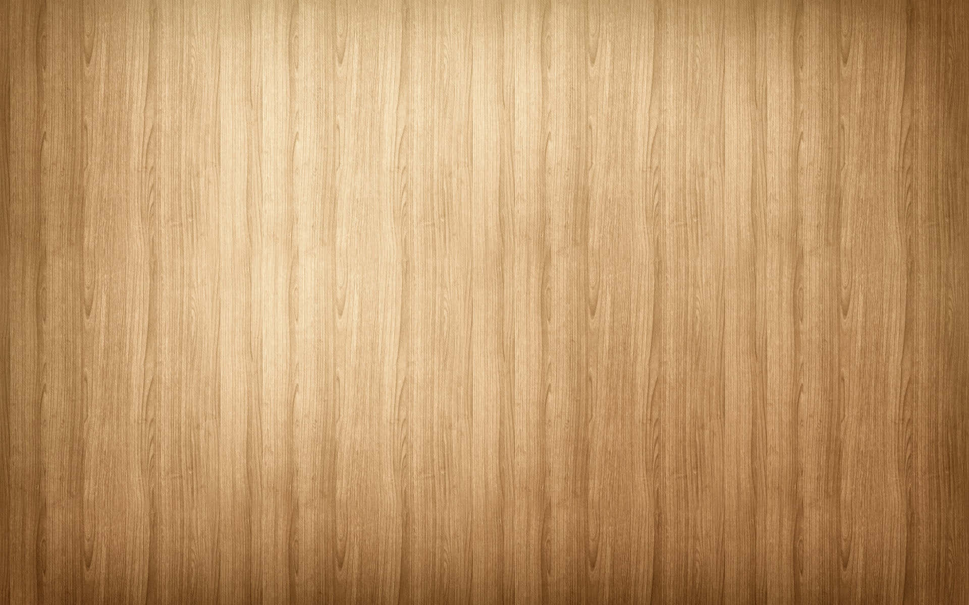 Brightly lit, light wood background with etched details