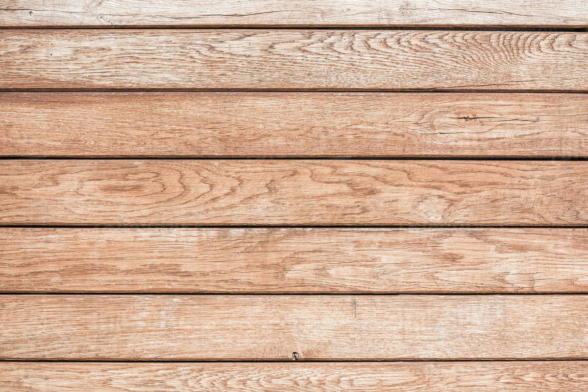 A Wooden Background With A Brown Color