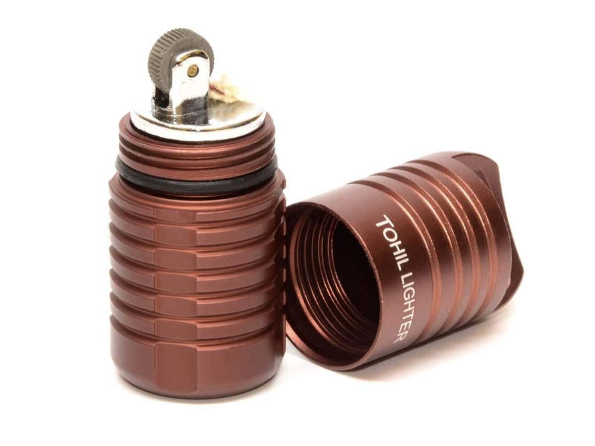 A Brown Lighter With A Metal Lid
