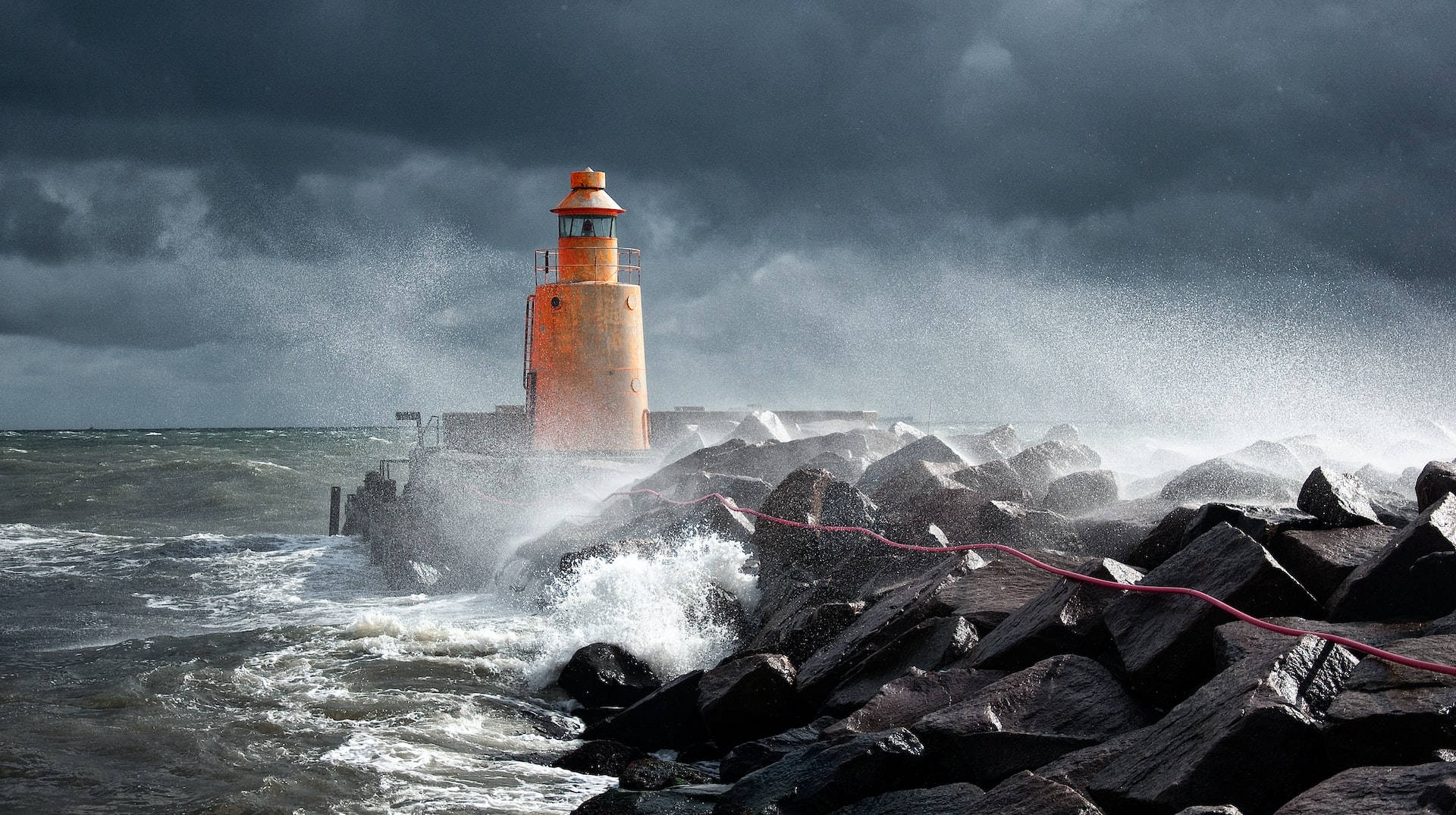 Lighthouse And Moving Water Wallpaper