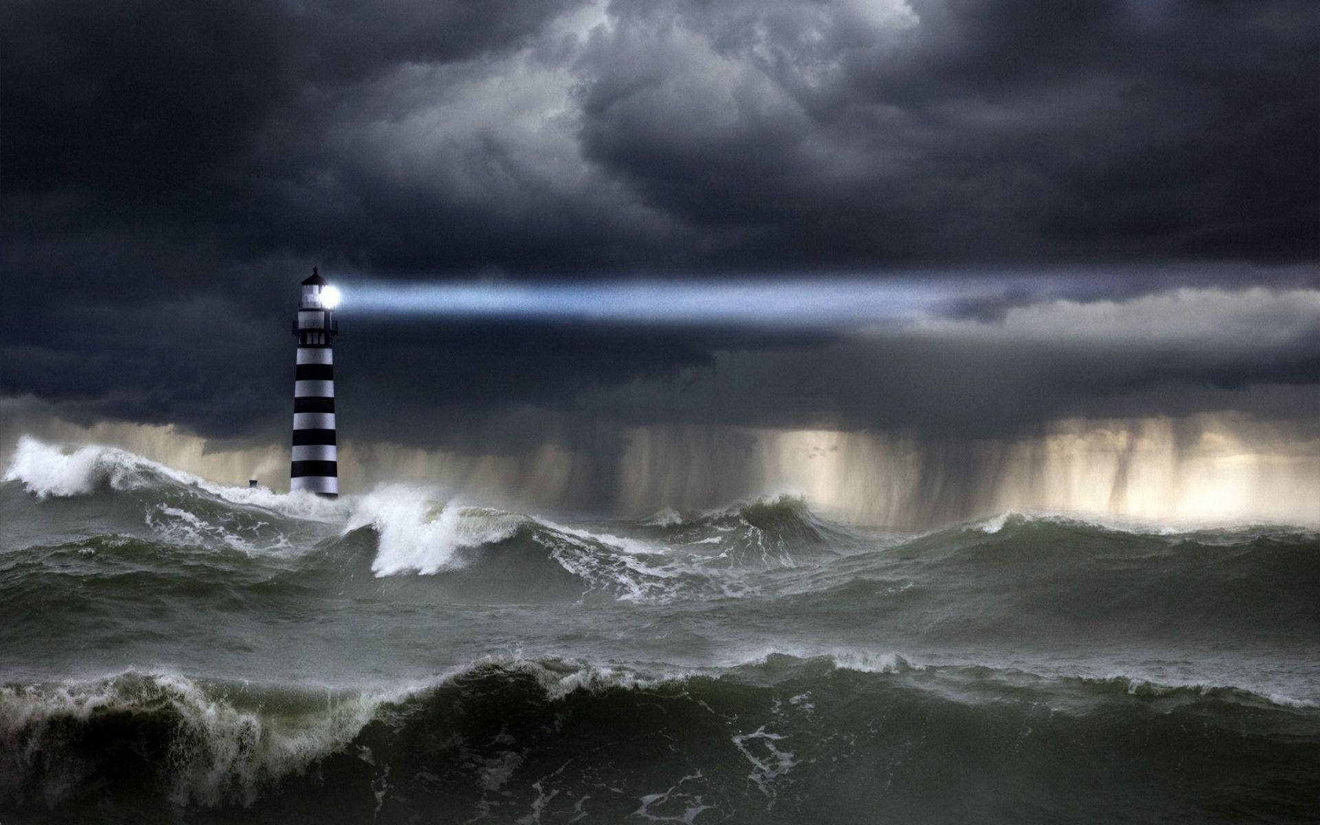 Lighthouse By Stormy Waters Wallpaper