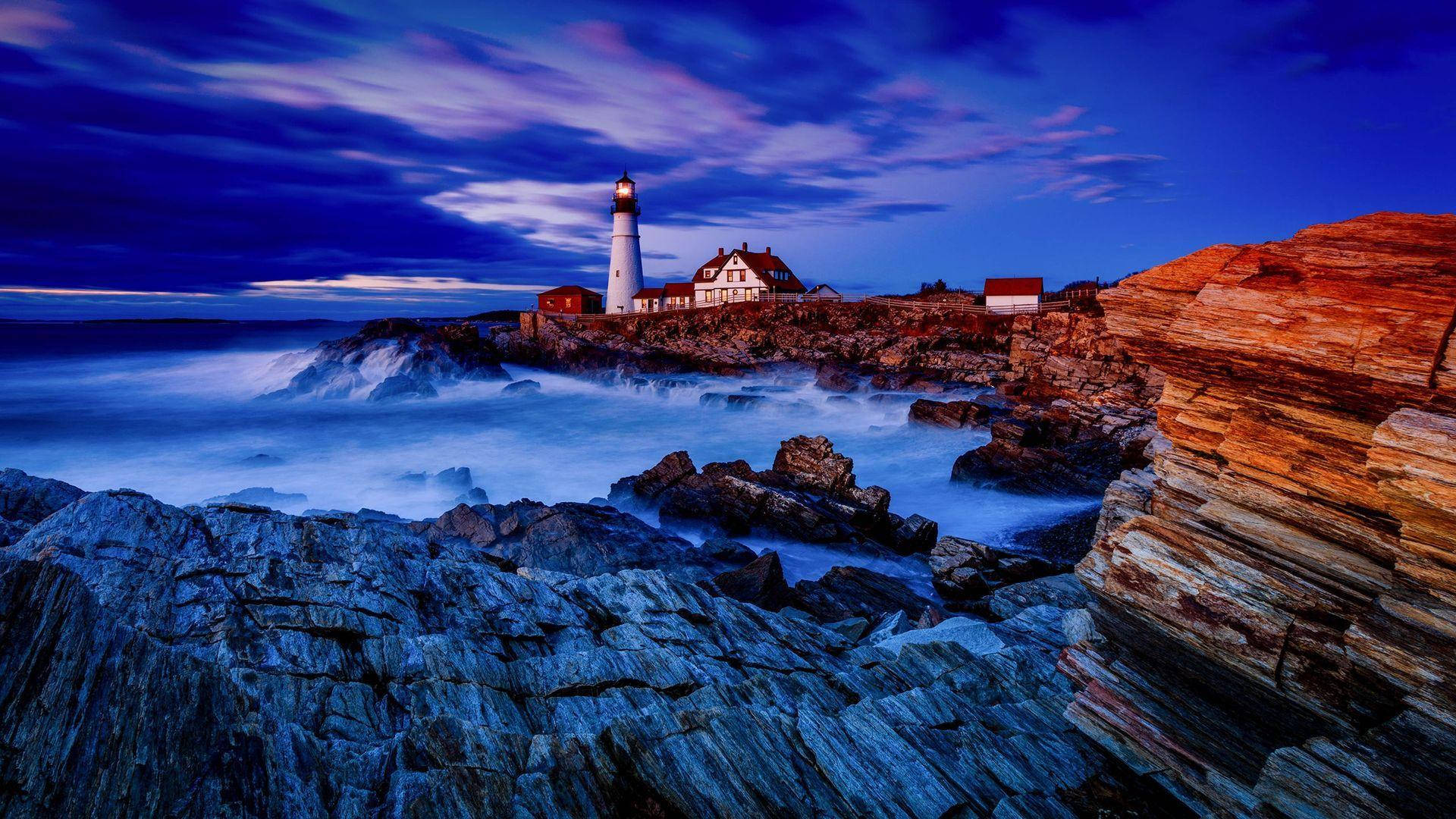 Lighthouse On Cliff Wallpaper