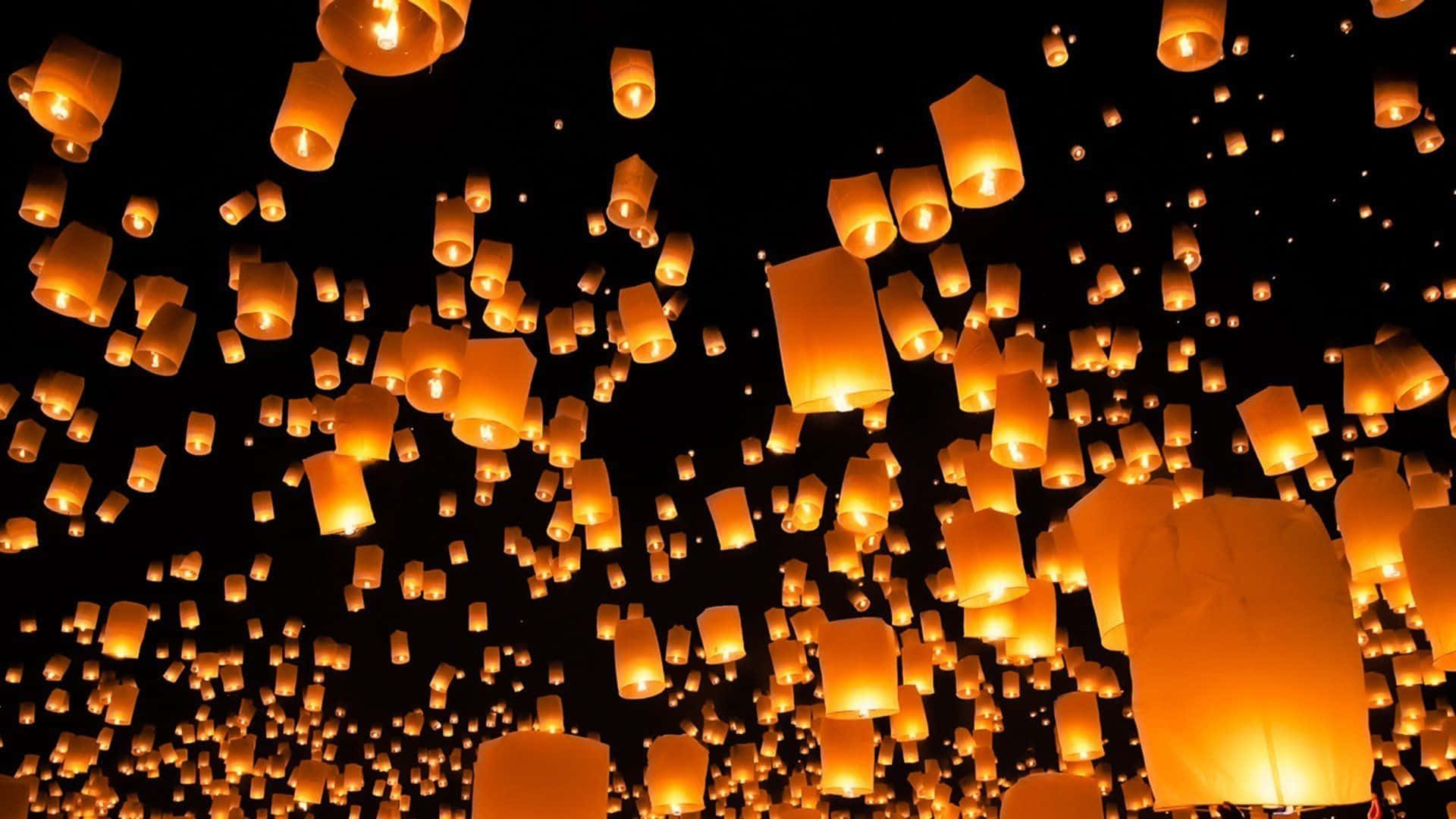 En gruppe lanterner svævende i luften