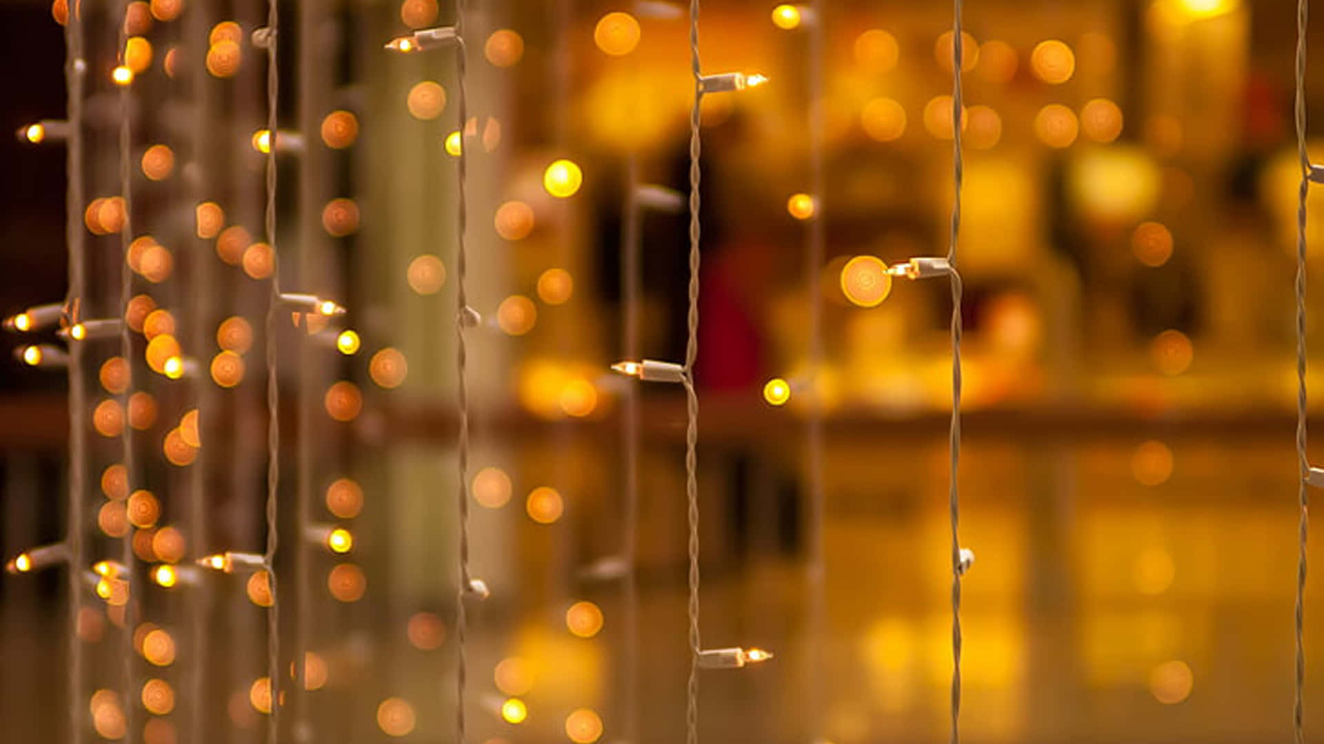 a string of lights hanging from a wall
