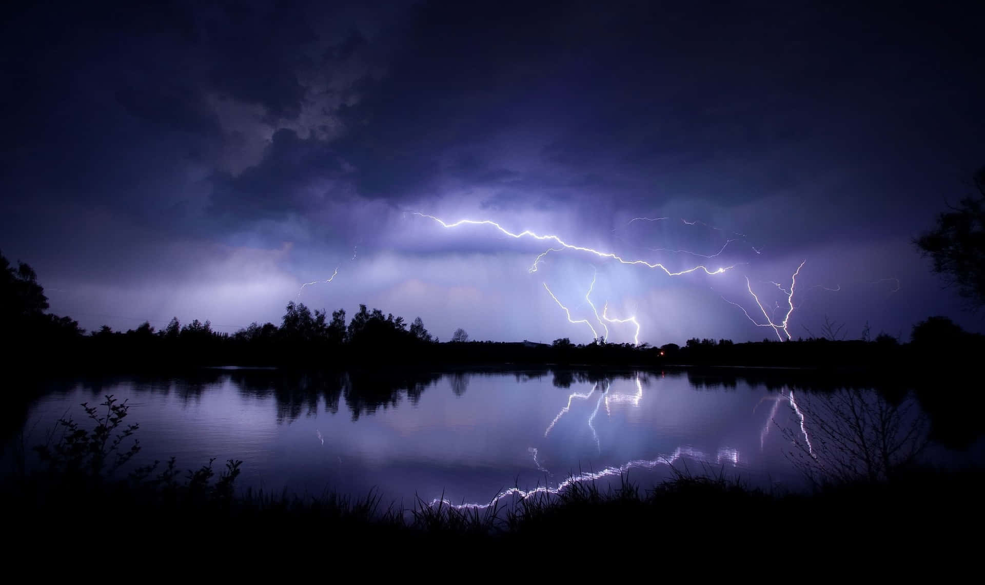 Bright Lightning Bolt Strikes Above a Stormy Sky