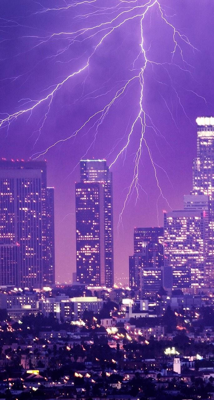 Lightning Over City Neon Purple Iphone Wallpaper