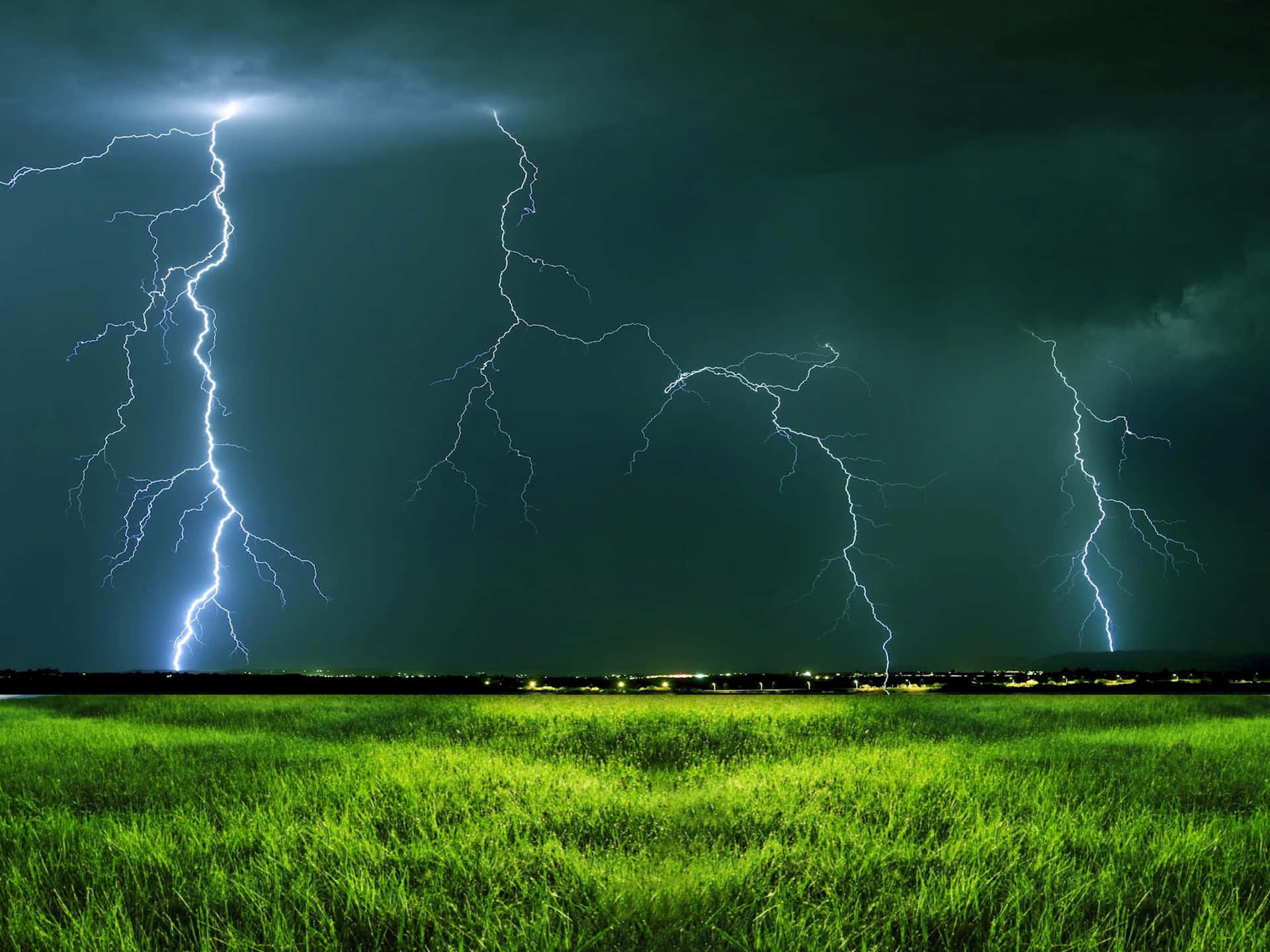 Electric Bolt of Lightning Illuminating the Night Sky