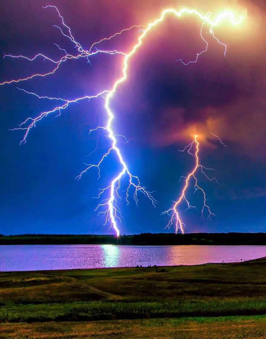 A majestic lightning storm approaching the night sky