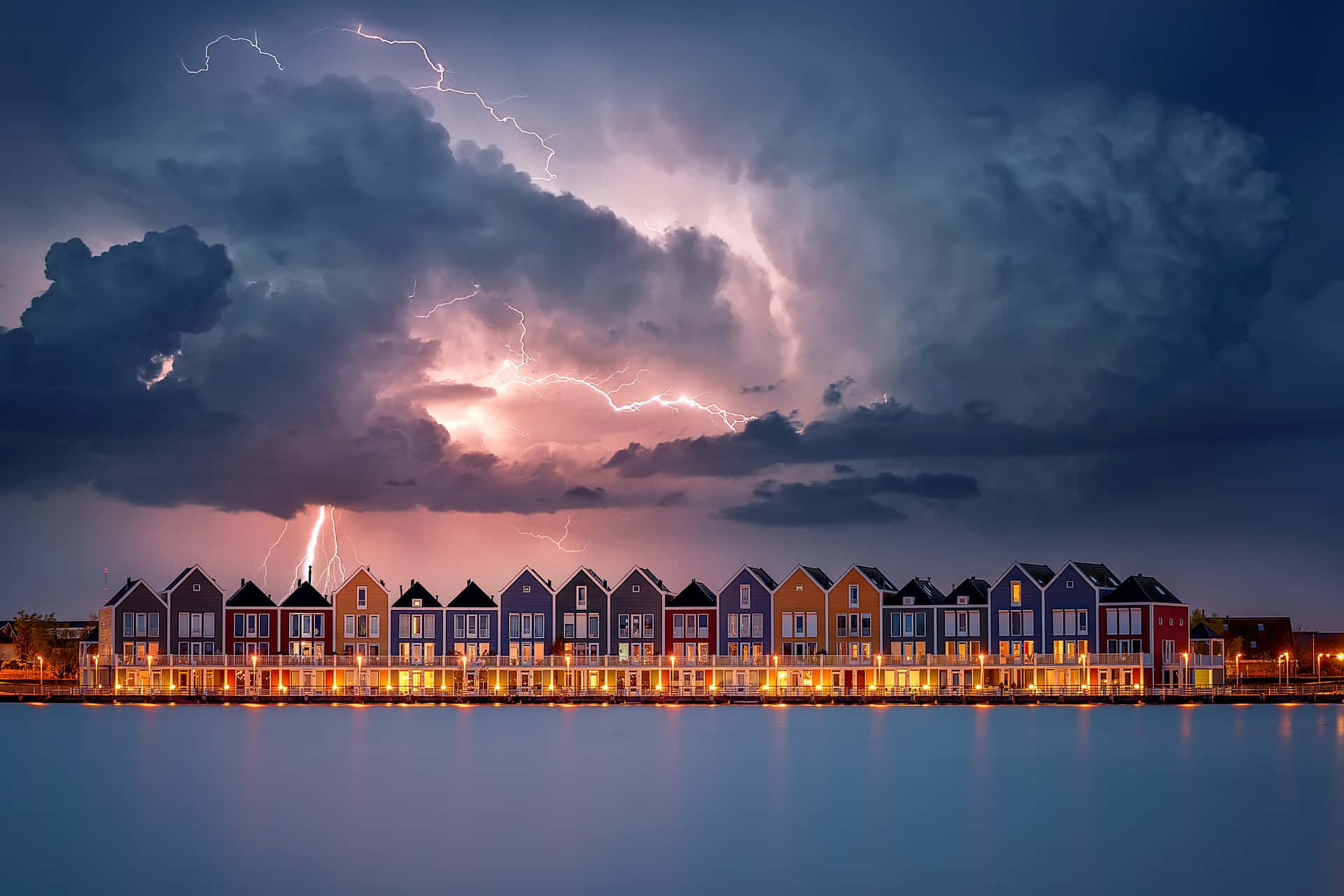 Lightning Strike Over Waterfront Houses Wallpaper