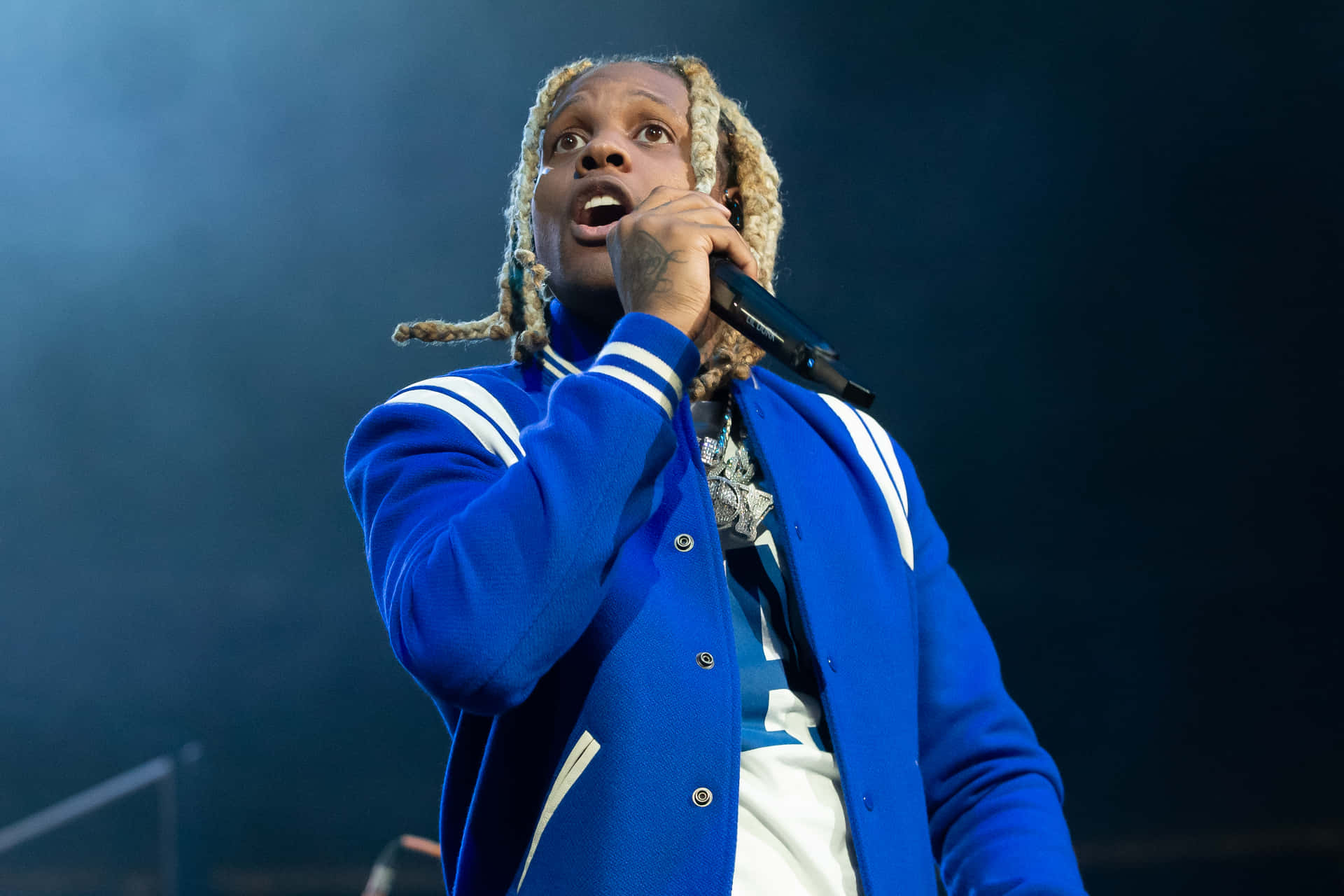 Download Lil Durk striking a pose in a stylish outfit