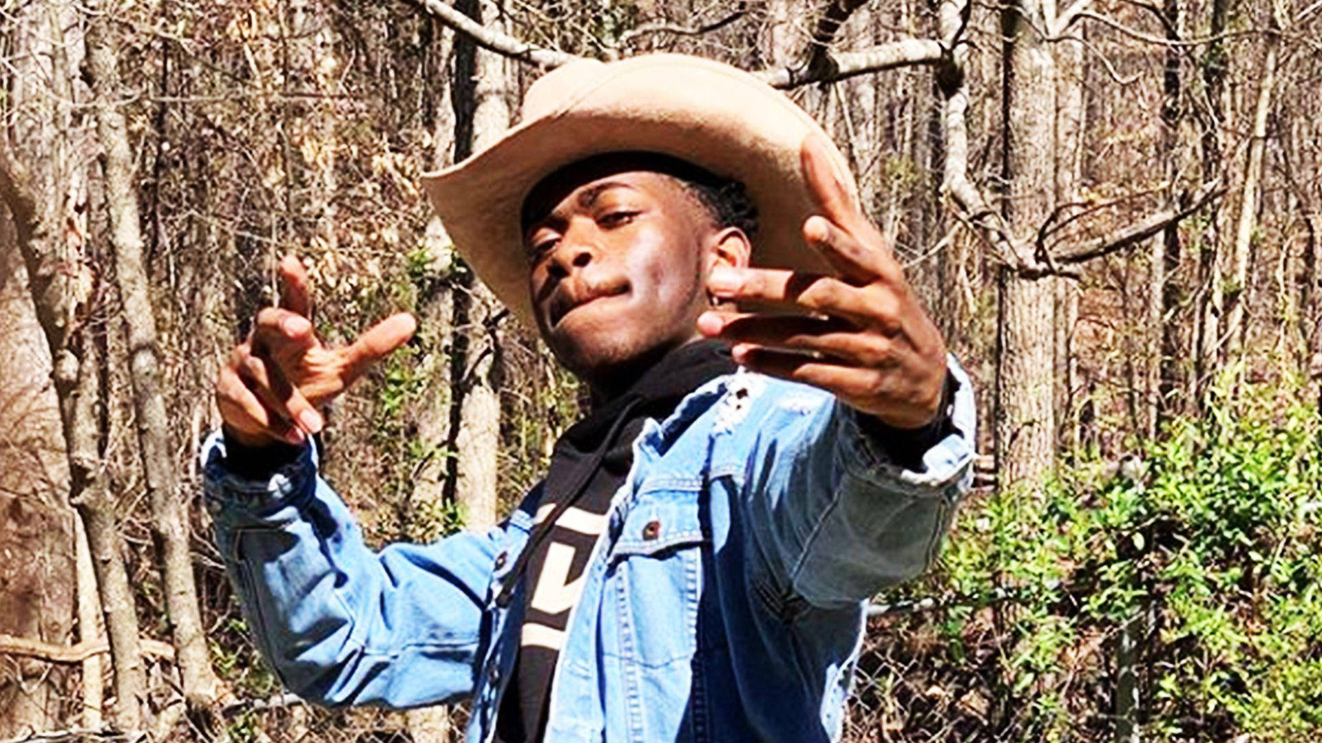 Lil Nas X Denim Outfit Background