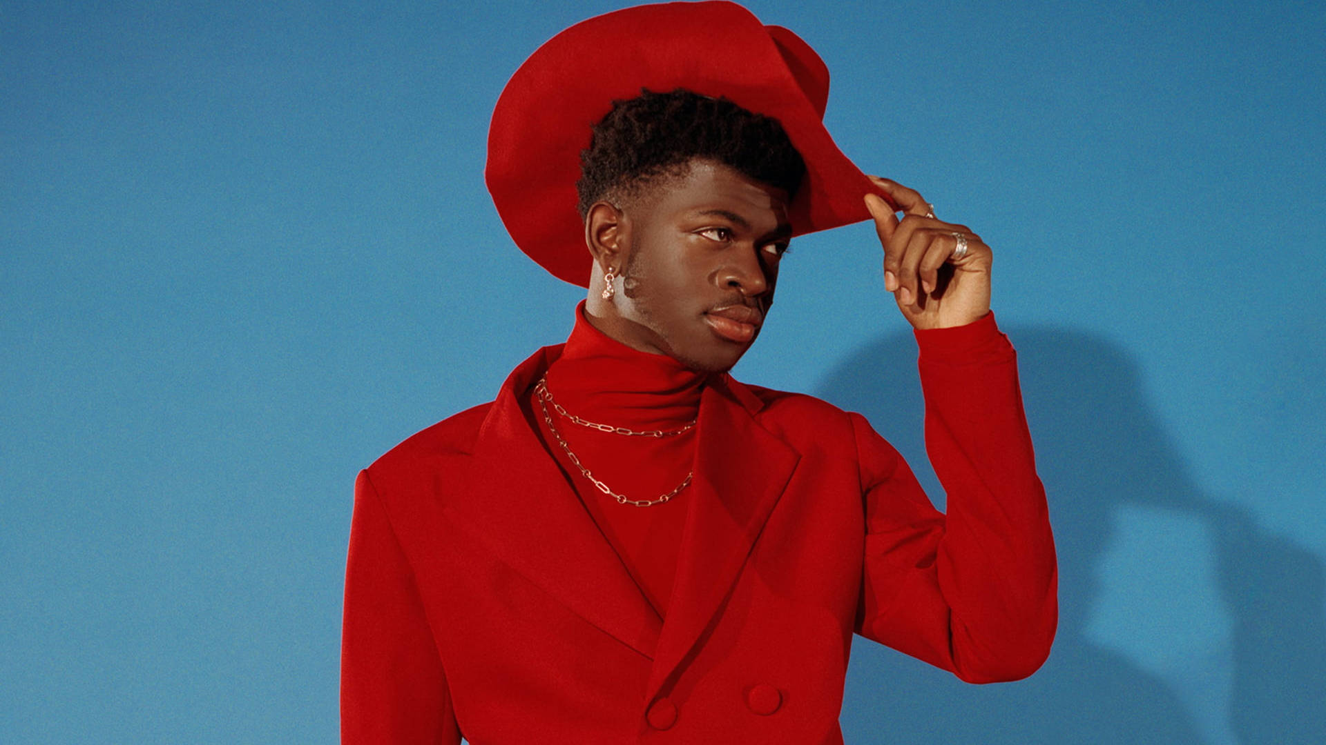 Lil Nas X Red Suit Outfit Background