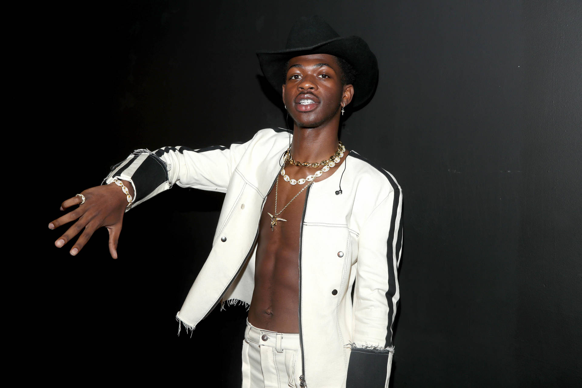 Lil Nas X White Cowboy Outfit Background