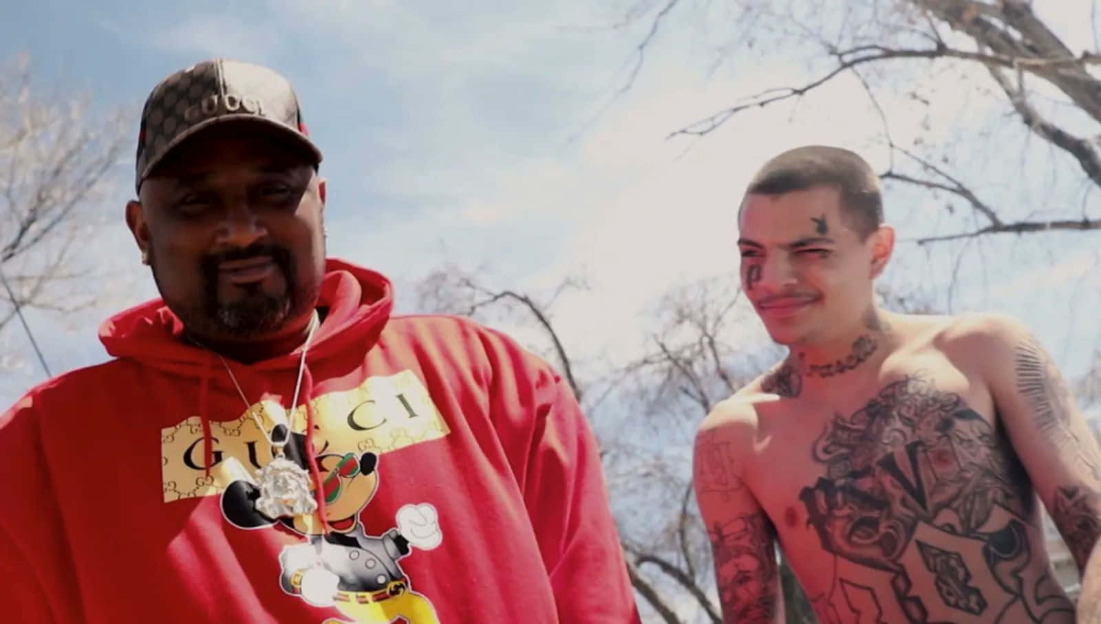 Lil Travieso And Collaborator Outdoors Wallpaper