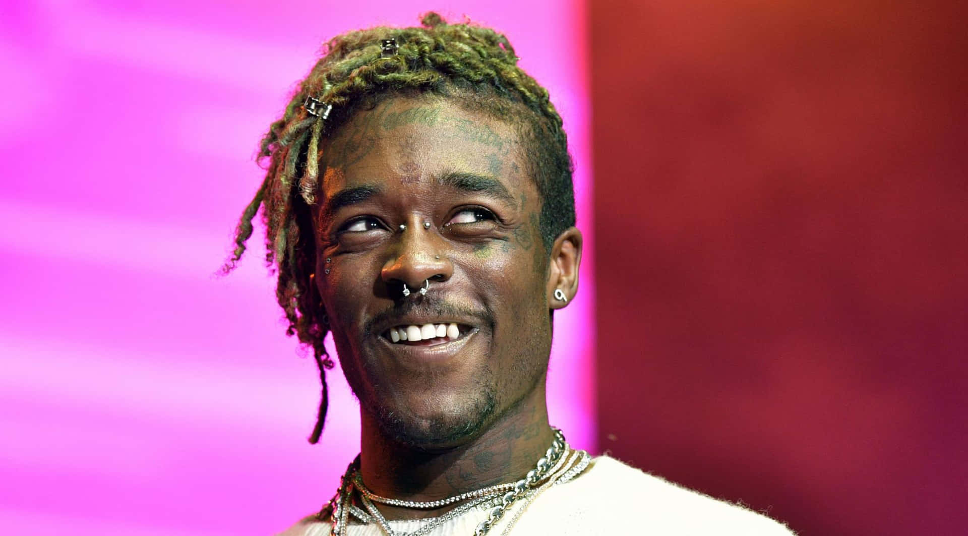 Lil Uzi Vert striking a pose in a stylish outfit