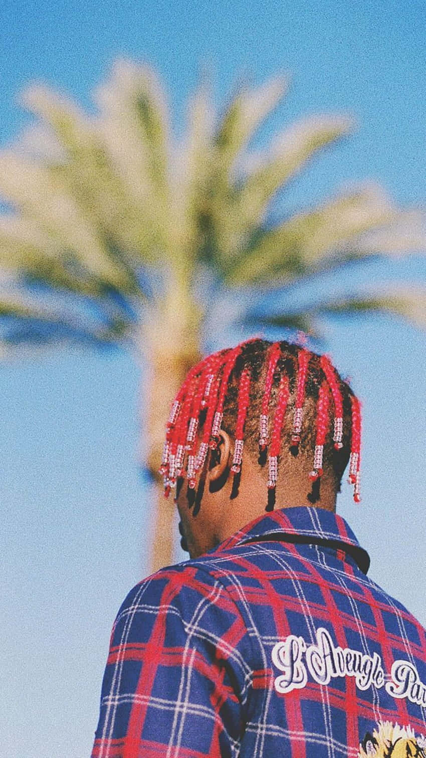Rapper Lil Yachty performs at the MAXIMAS stage at Hangout Music Festival Wallpaper