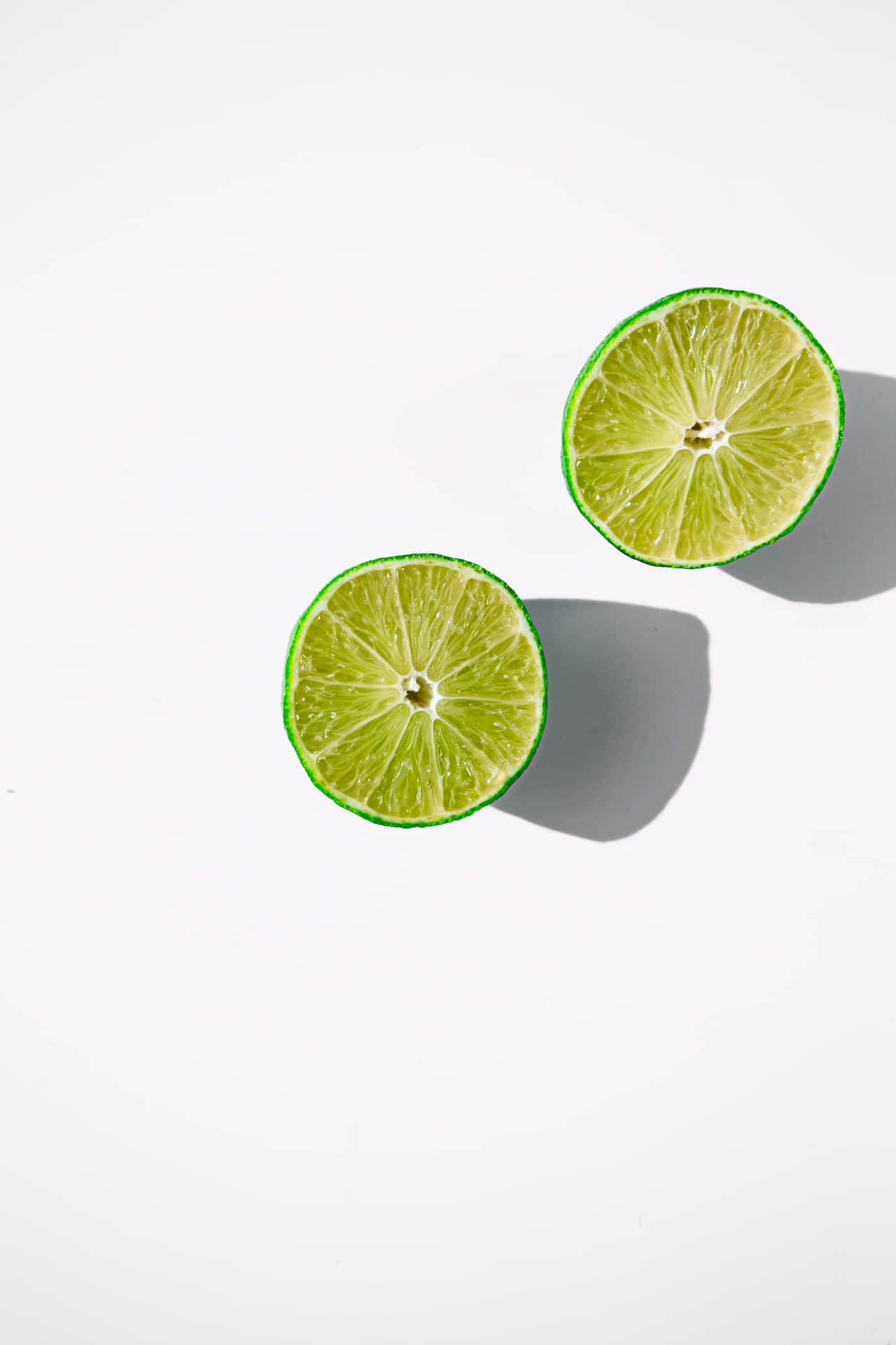 Lime Slices On White Background