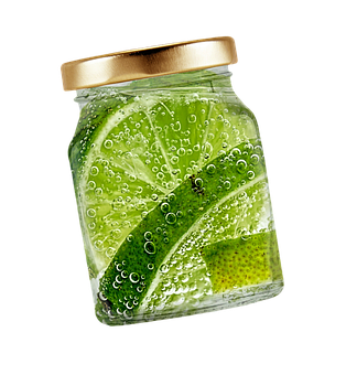 Download Lime Slicesin Glass Jar | Wallpapers.com