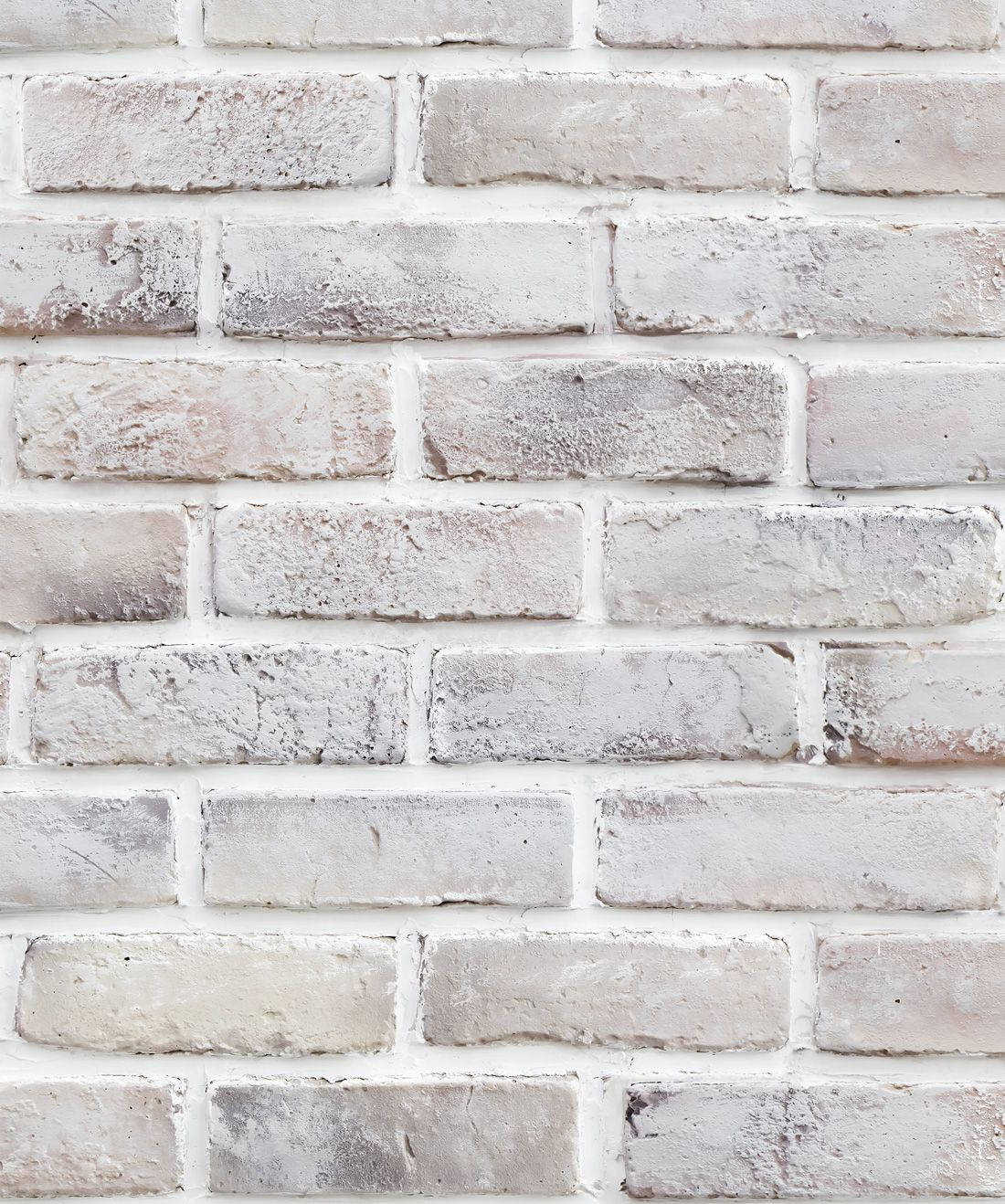 A Lime Washed White Brick Wall in Stretcher Bond Wallpaper